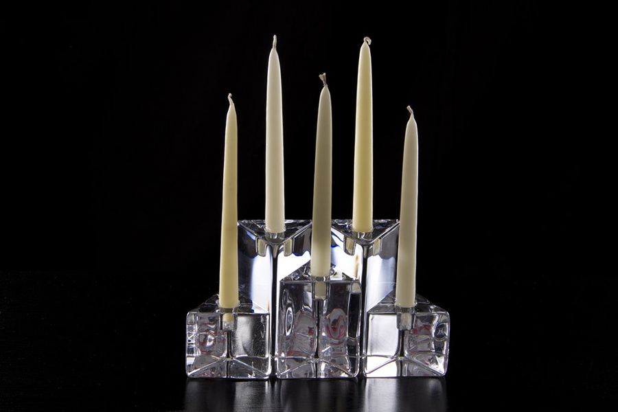 New Beginnings tapers glowing in crystal candle holders